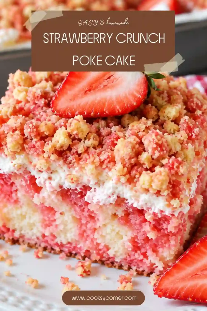 Strawberry Crunch Poke Cake topped with fluffy cream cheese frosting, pink strawberry cookie crumbs, and fresh strawberries. The chilled cake has a moist strawberry-infused center and a colorful crunchy topping.