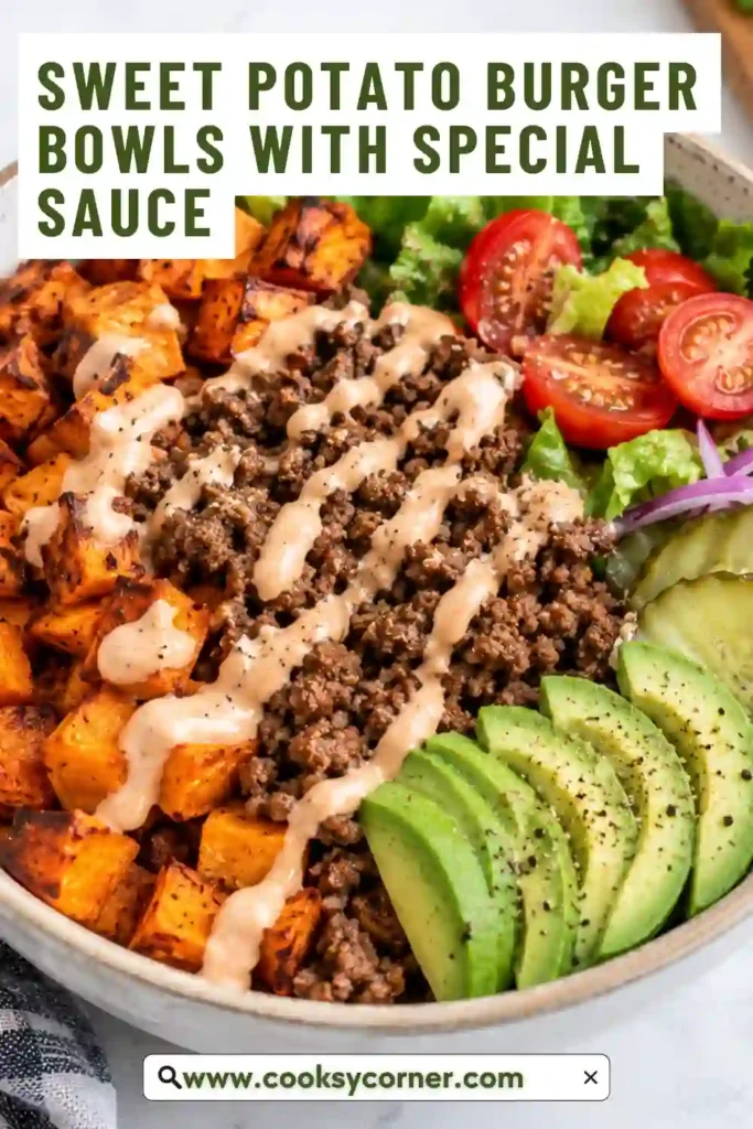 Healthy burger bowls topped with seasoned beef, golden sweet potatoes, fresh tomatoes, lettuce, red onion, and shredded cheddar. A creamy special sauce adds classic cheeseburger flavor.