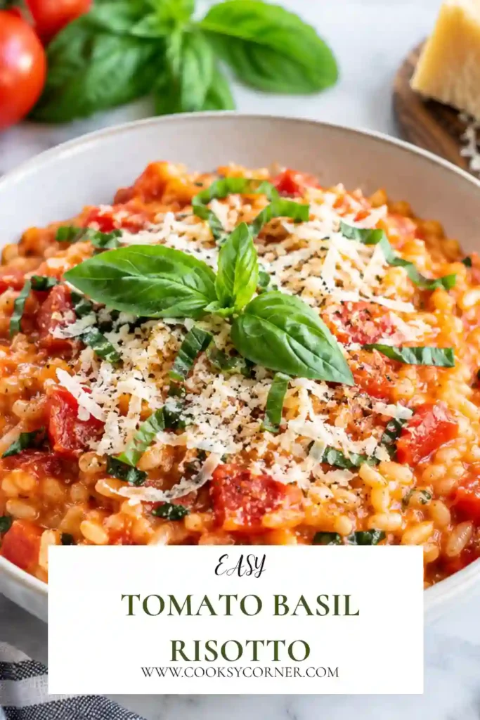 Creamy Tomato Basil Risotto served warm with fresh tomatoes, spinach, basil, and grated Parmesan. The Arborio rice has a rich, velvety texture with colorful fresh ingredients throughout.