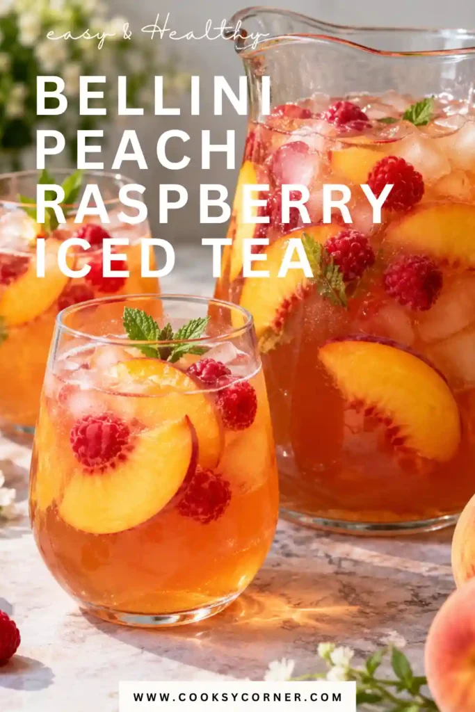 Refreshing Bellini Peach Raspberry Iced Tea with ice, juicy peach flavor, and tart raspberries. This alcohol-free fruity iced tea is made with a simple homemade syrup.