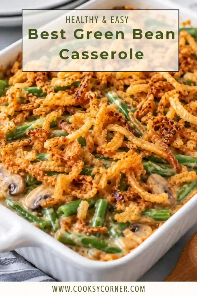 Best Green Bean Casserole served in a baking dish with creamy green beans, melted Cheddar cheese, and crispy fried onions. The golden onion topping covers the bubbling mushroom sauce filling