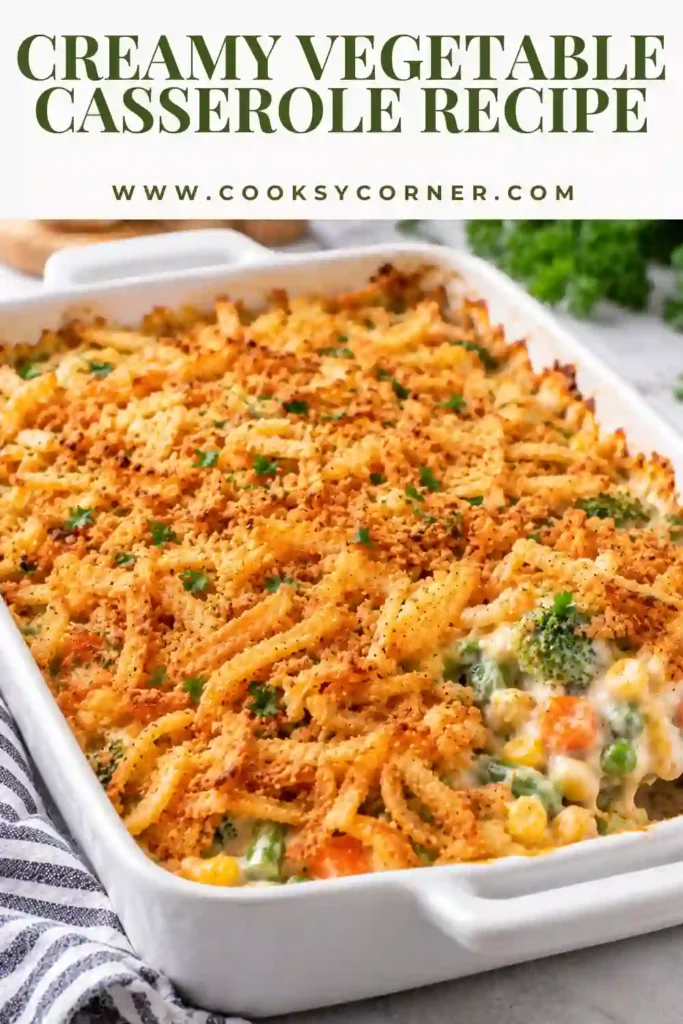 Creamy Vegetable Casserole Recipe with broccoli, cauliflower, and carrots covered in a rich cheese sauce. Golden panko breadcrumbs create a crispy topping over the baked vegetables.