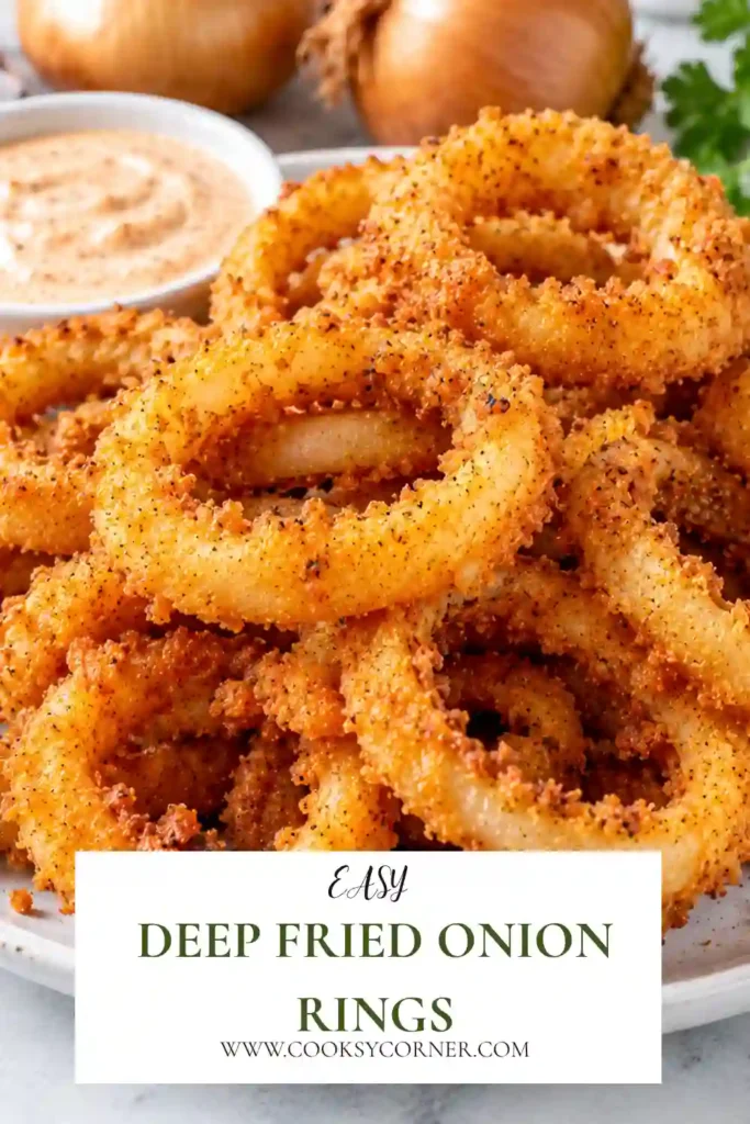 Crispy homemade onion rings fried until golden brown and served warm. Panko breadcrumbs create a textured restaurant-style coating around each onion ring.