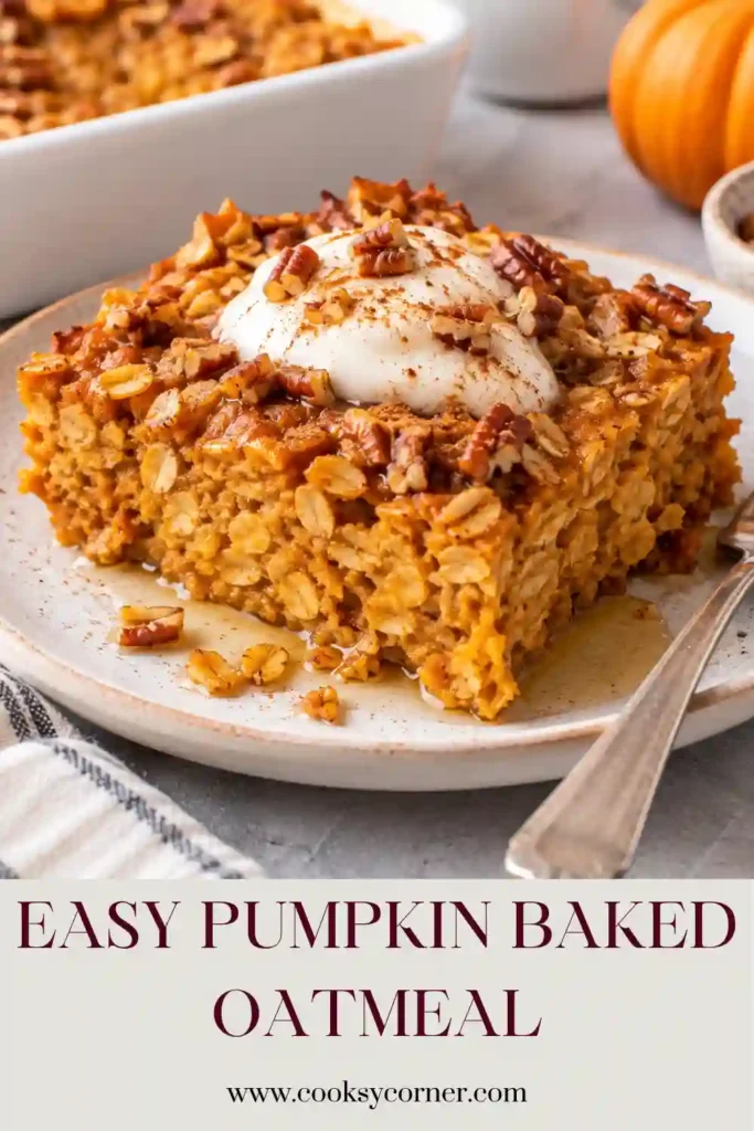Pumpkin Baked Oatmeal sliced into warm squares with a soft pumpkin center and lightly golden top. The oatmeal breakfast bake is topped with pecans and served with maple syrup.
